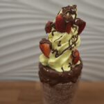 Chimney cake with Vanilla Ice Cream, Belgian Chocolate and Fresh Strawberries