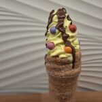 Chimney cake with Vanilla Ice Cream, Belgian Chocolate covered with Czech Smarties